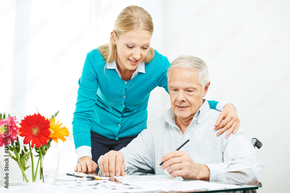 Obraz premium Family caring for senior man at home