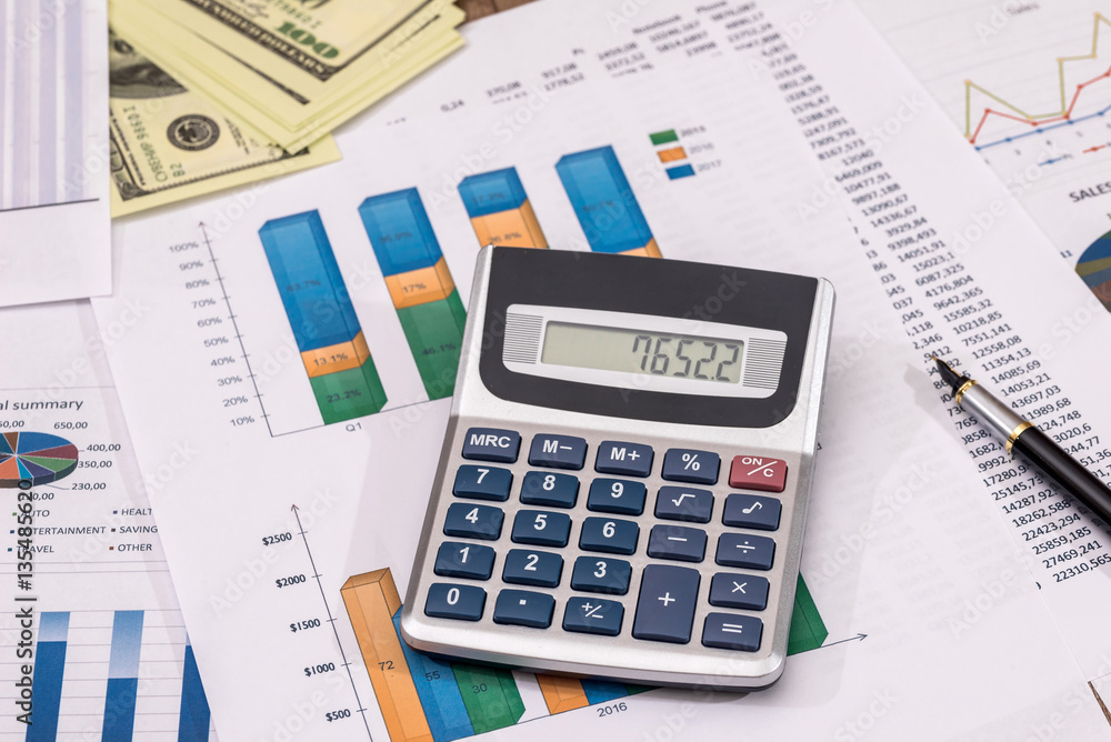 Business concept of office working - counting about cost annual budget. Business concept of office working - counting about cost annual budget.