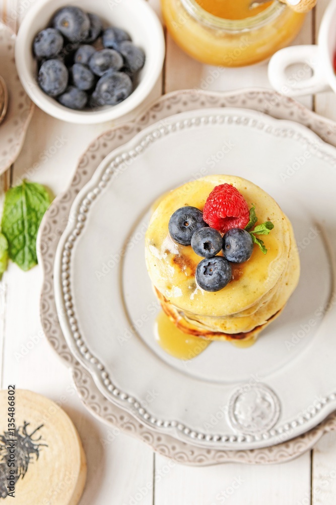 Blueberry pancakes with fresh fruits Blueberry pancakes with fresh fruits