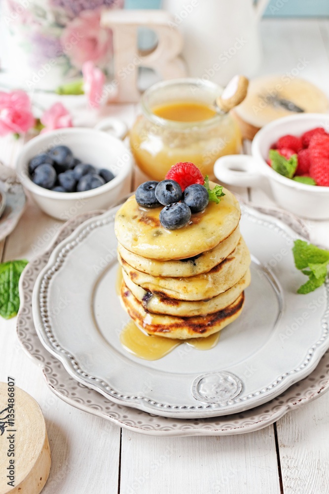 Blueberry pancakes with fresh fruits Blueberry pancakes with fresh fruits