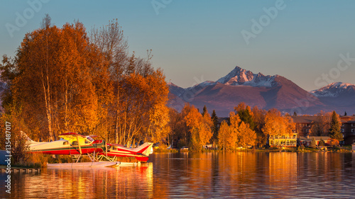 Warm colors of sunset at Spenard Lake in Anchorage. USA photo