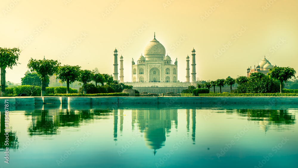 Taj Mahal with reflection in water in early morning from Mehtab bagh