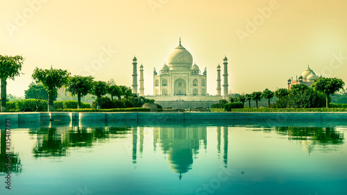Taj Mahal with reflection in water in early morning from Mehtab bagh photo