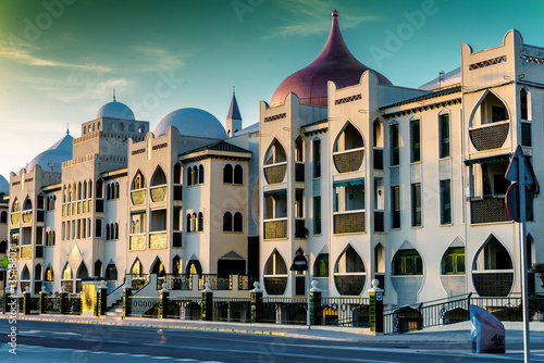 Modern Moorish style architecture in the Mediterranean town of Santa Pola, Spain. photo