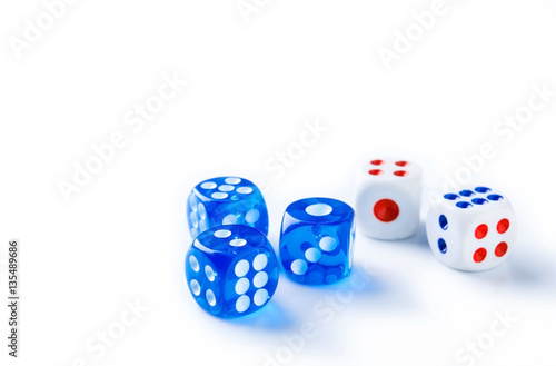 blue and white dices on light background