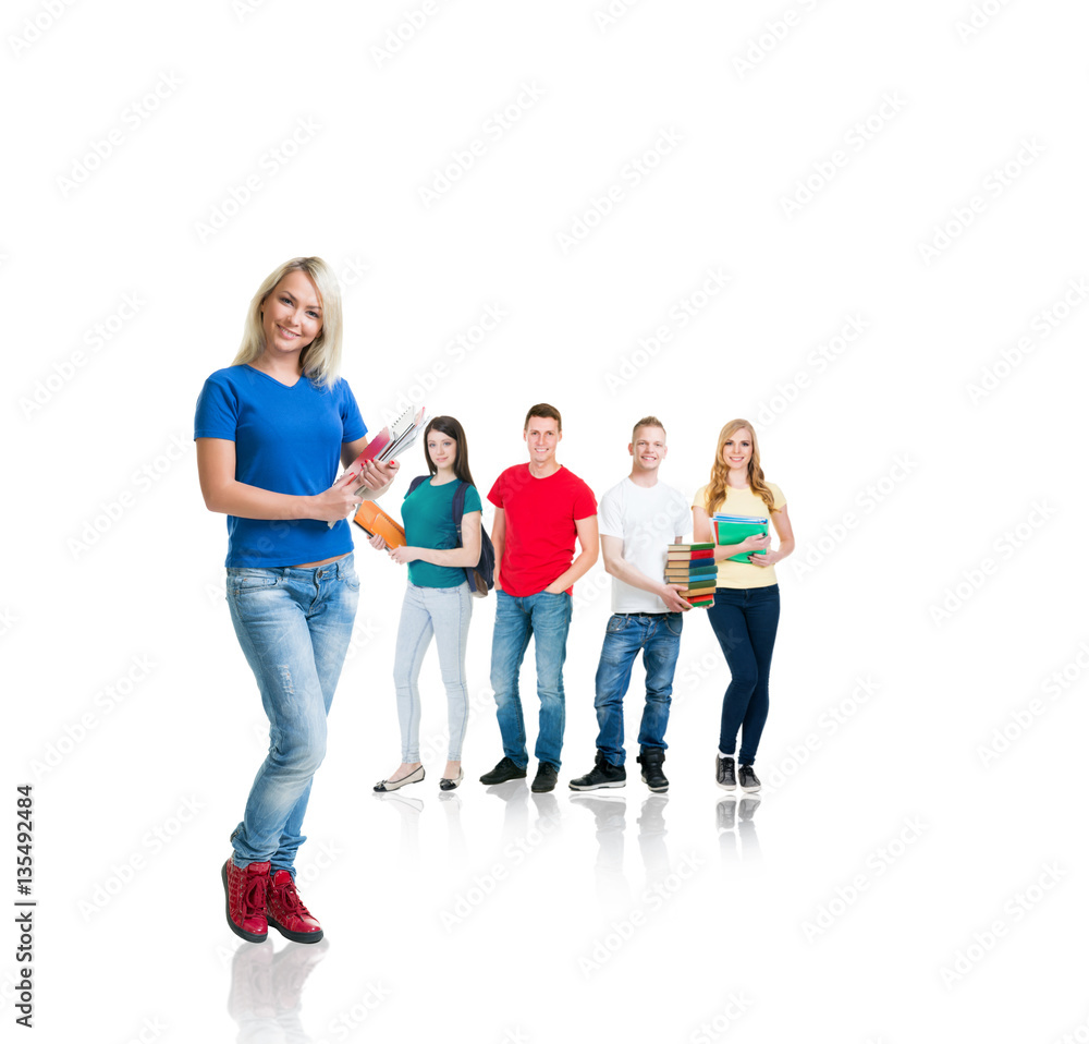 Fototapeta premium Large group of teenage students isolated on white background. Many different people standing together. School, education, college, university concept.