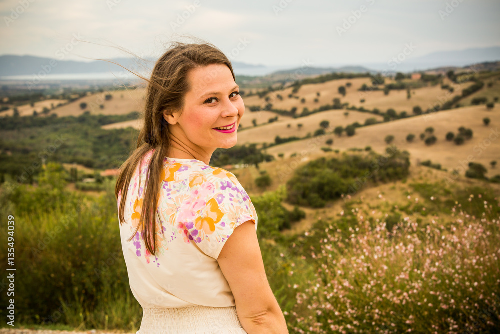 Girl at sunset in the Tuscan region Maremma, Italy Girl at sunset in the Tuscan region Maremma, Italy