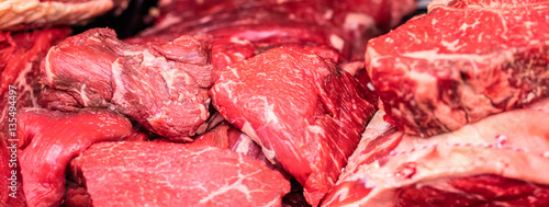 fresh raw meat of beef for steaks at butcher shop