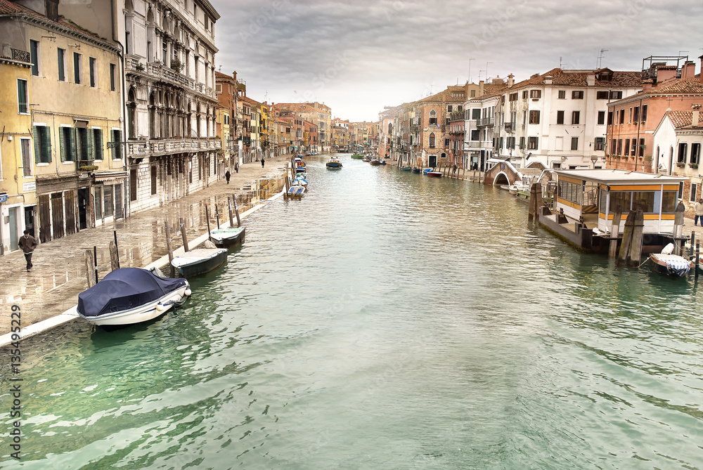 Obraz premium Canal with gondolas in Venice, night view, Italy
