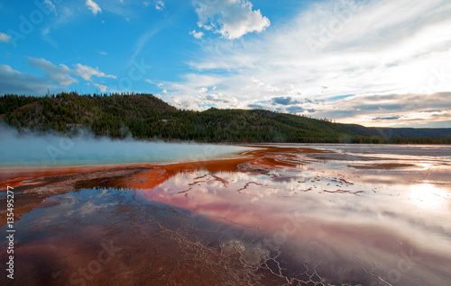 Grand Prismatic Spring under sunset clouds in Yellowstone National Park in Wyoming USA