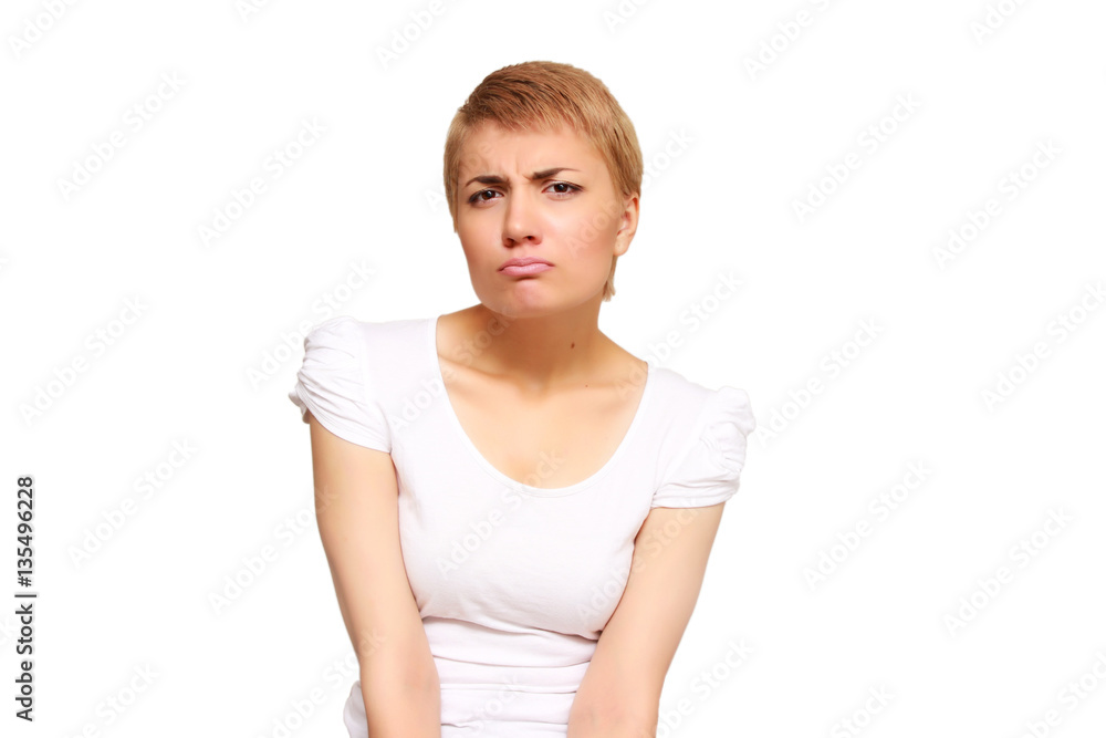 young woman is disappointed by the extent of her waist young woman is disappointed by the extent of her waist