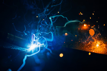 artistic welding sparks light, industrial background