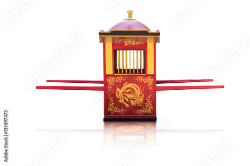 Traditional Chinese culture,Palanquin carrying the bride isolated on white background with clipping path.