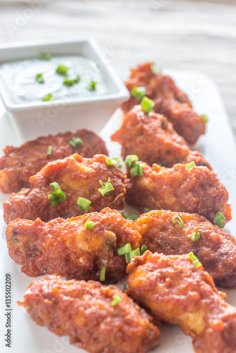 Fried chicken wings with blue cheese sauce