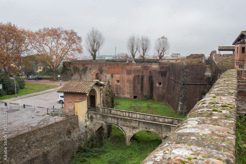 Moat and bridge to the main gate of the Medici Fortress of Santa Barbara. Pistoia. Tuscany. Italy.