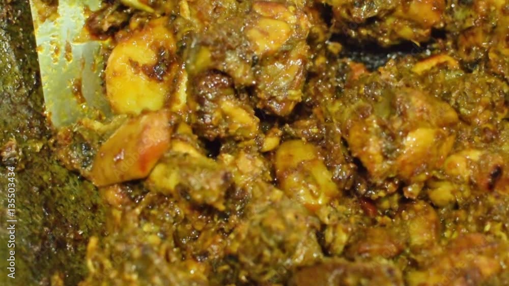 Preparation of smoking hot chicken curry, one of the spicy delicacies of Indian foods. India is famous for such colorful foods for long time. Preparation of smoking hot chicken curry, one of the spicy delicacies of Indian foods. India is famous for such colorful foods for long time.