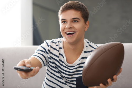 Teenager watching rugby at ...