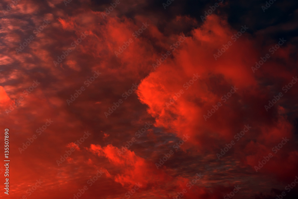 Fiery sunset . storm clouds.