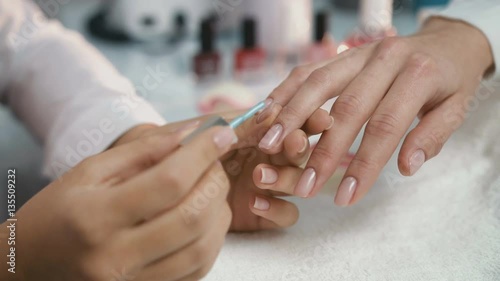 Woman hands during manicure procedure