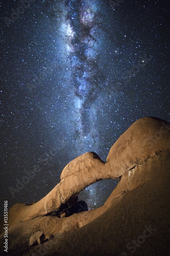 Rock arch under the Milky Way photo