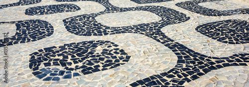 Black and white iconic mosaic by old design pattern at Ipanema Beach Rio de Janeiro - Brazil photo
