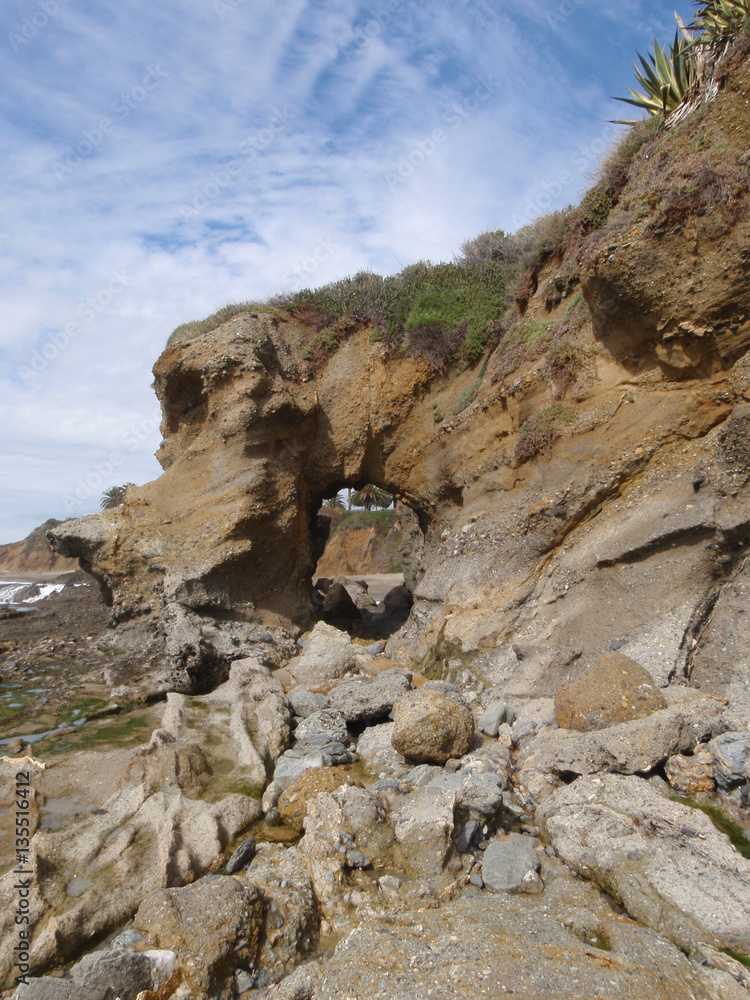 The keyhole sea arch at Pearl Street beach near Laguna Beach, California.