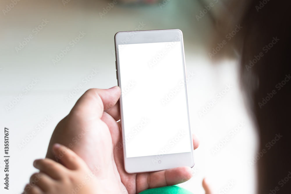 Little girl watching cartoon on mobile device. Little girl watching cartoon on mobile device.