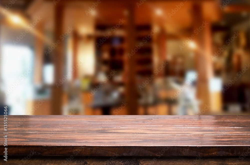Selected focus empty brown wooden table and Coffee shop or resta Selected focus empty brown wooden table and Coffee shop or resta