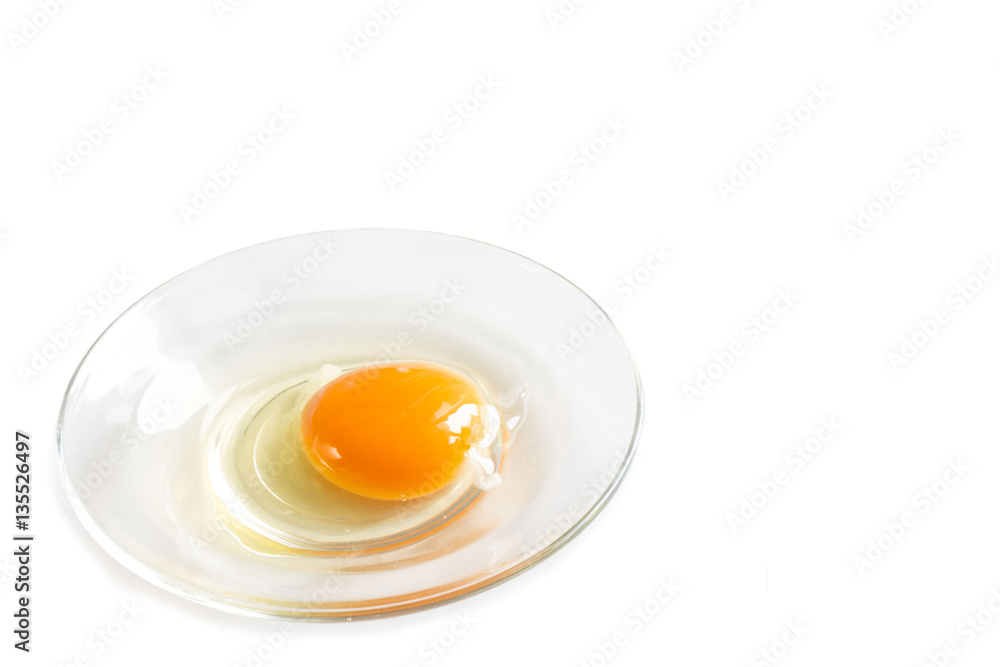 fresh homemade broken egg on a saucer fresh homemade broken egg on a saucer