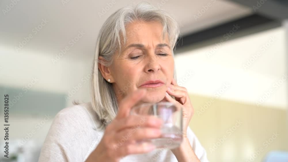 Senior woman with toothache Senior woman with toothache