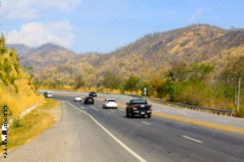 Abstract blur image of The empty road in the mountains Abstract blur image of The empty road in the mountains