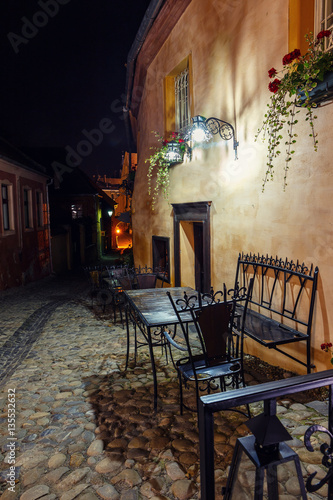 street cafe bar at night in Romania