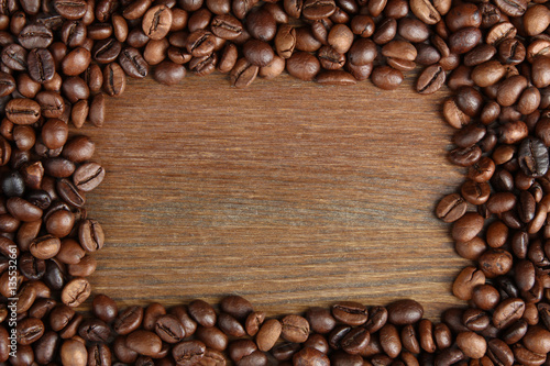 Background with roasted coffee in a frame.