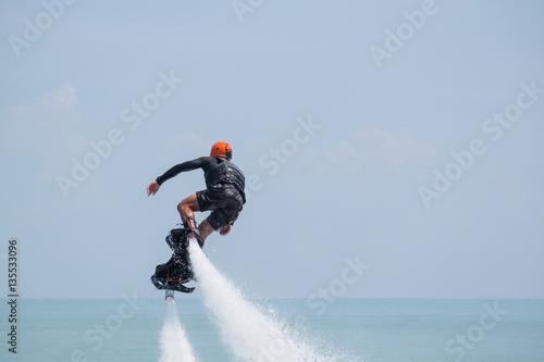 Showing flyboard on Ao Makham during Children's day in Phuket, T