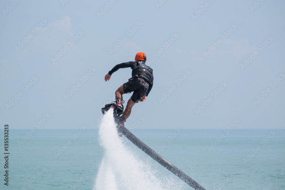 Showing flyboard on Ao Makham during Children's day in Phuket, T