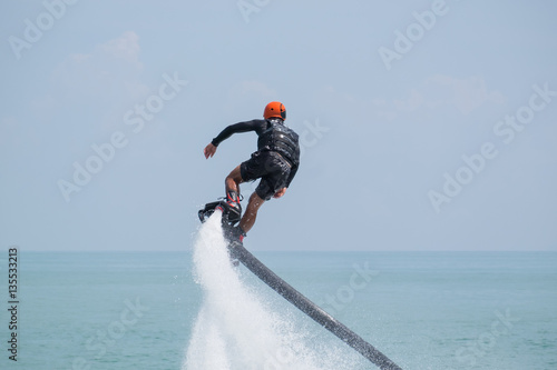 Obraz na płótnie Showing flyboard on Ao Makham during Children's day in Phuket, T w salonie
