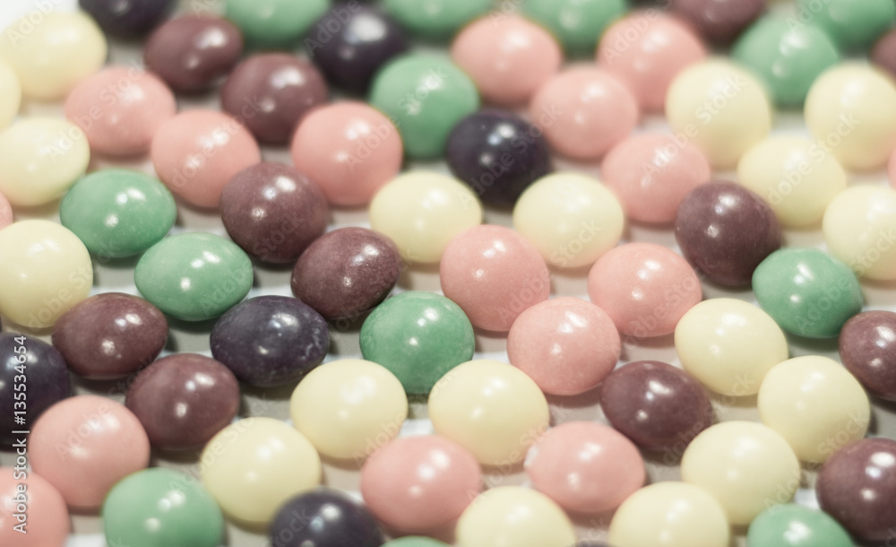 Obraz premium Multi colored pills or bubbles background close up