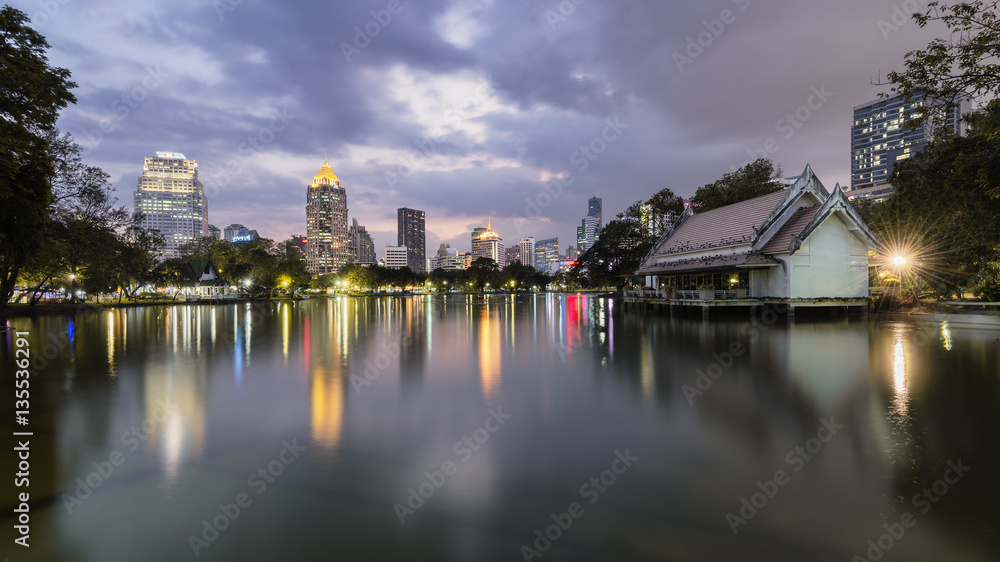 Fototapeta premium Bangkok skyline from Lumpini Park in the night of Chinese New Year Eve
