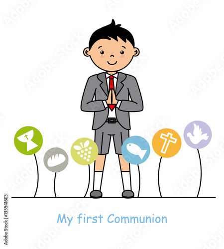 my first communion boy. Boy with communion suit and religious icons