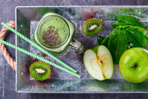 Smoothies of green vegetables and fruits.Kiwi,Apple,spinach,Chia seeds.Drink Concept of Healthy Eating. selective focus.