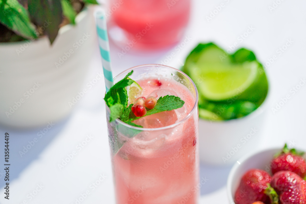 Berry Lemonade with Ice and Mint in a Glass Berry Lemonade with Ice and Mint in a Glass