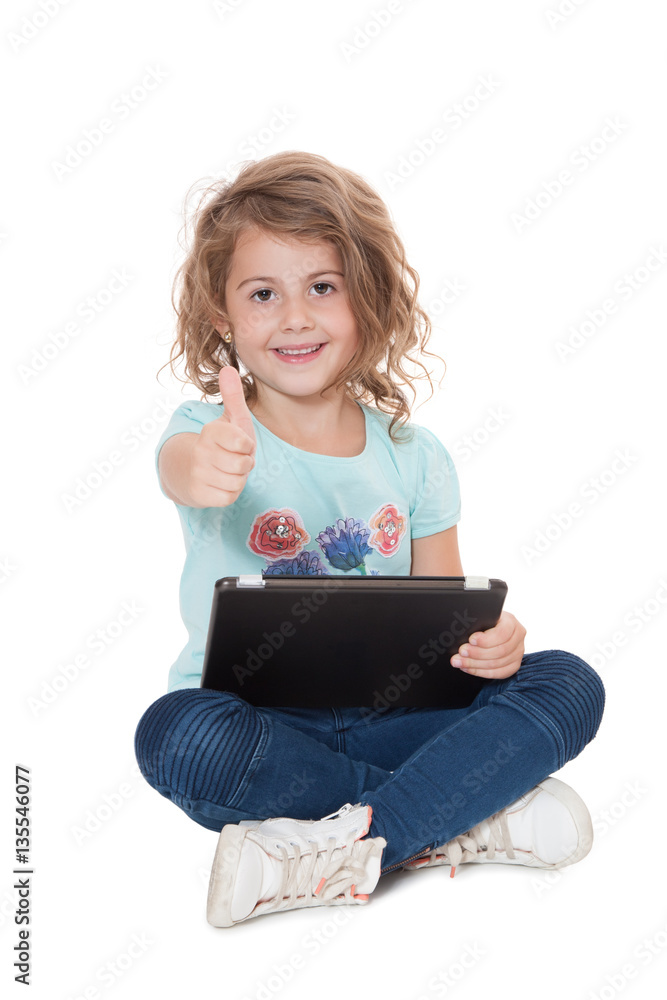Young girl using tablet device Young girl using tablet device