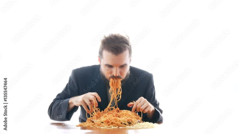Dirty businessman eating pasta on the table. Nasty business and disgusting consumerism concept, studio isolated on white background. Dirty businessman eating pasta on the table. Nasty business and disgusting consumerism concept, studio isolated on white background.