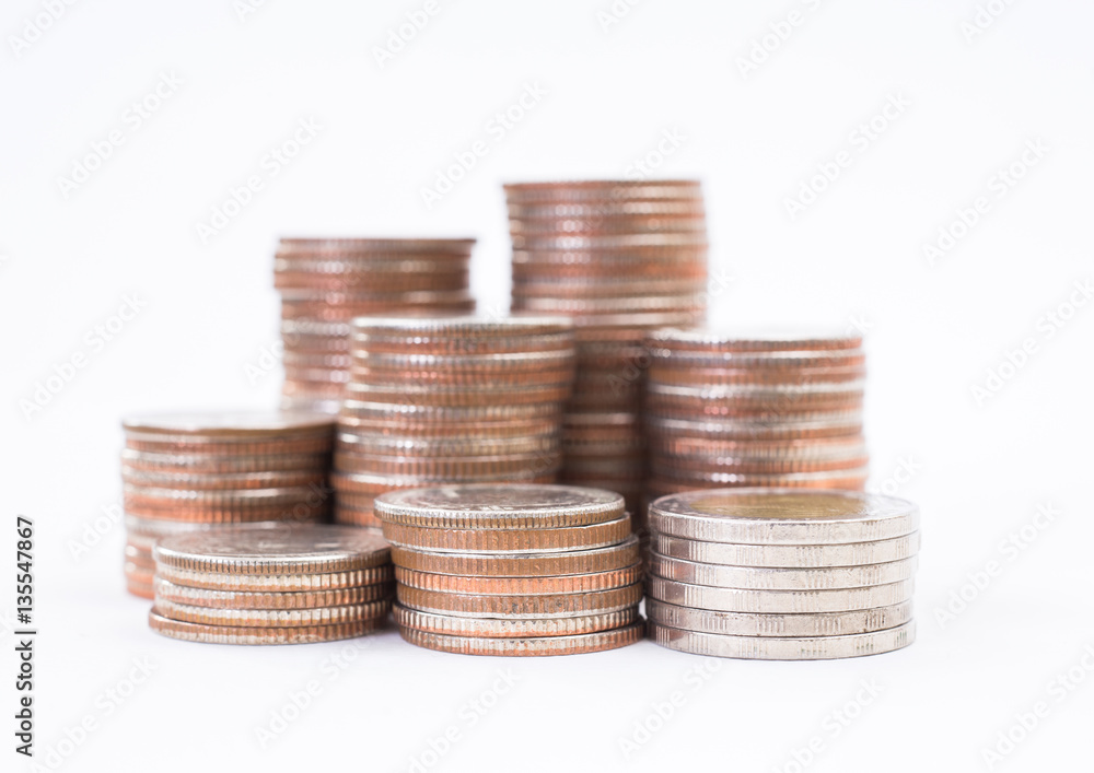 Selective focus of stack of US. dollar coins on white background Selective focus of stack of US. dollar coins on white background