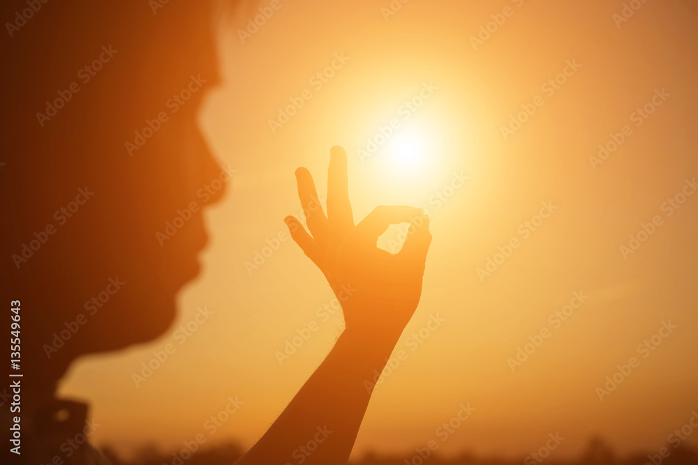 hands forming a heart shape with sunset silhouette hands forming a heart shape with sunset silhouette