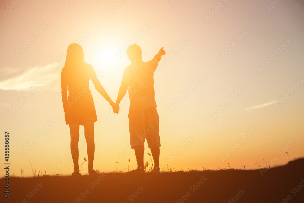 silhouette of a man and woman holding hands with each other, wa silhouette of a man and woman holding hands with each other, wa