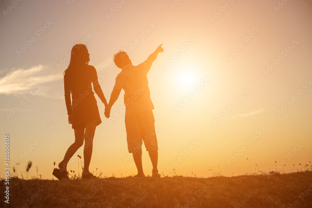 silhouette of a man and woman holding hands with each other, wa silhouette of a man and woman holding hands with each other, wa