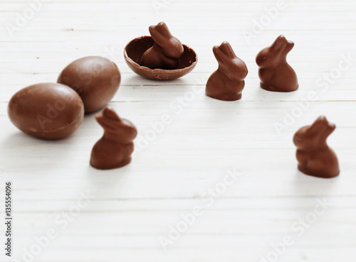 Chocolate Easter Eggs on white wooden background