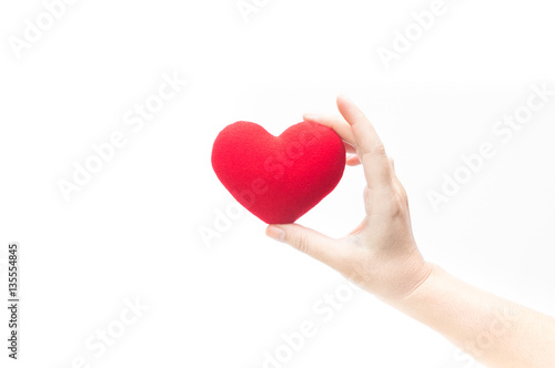 Woman hand holding blank red heart isolated on white background Symbol of love or dating