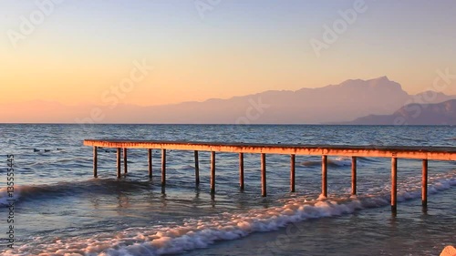 Pontile al tramonto, lago di Garda